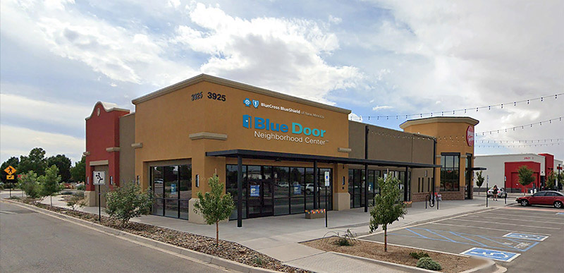 Exterior rendering of a planned Blue Door Neighborhood Center at Las Estancias Way.