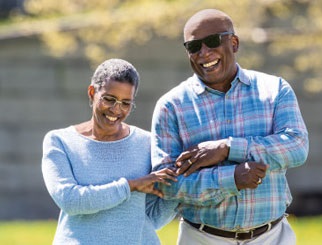 Seniors walking in park