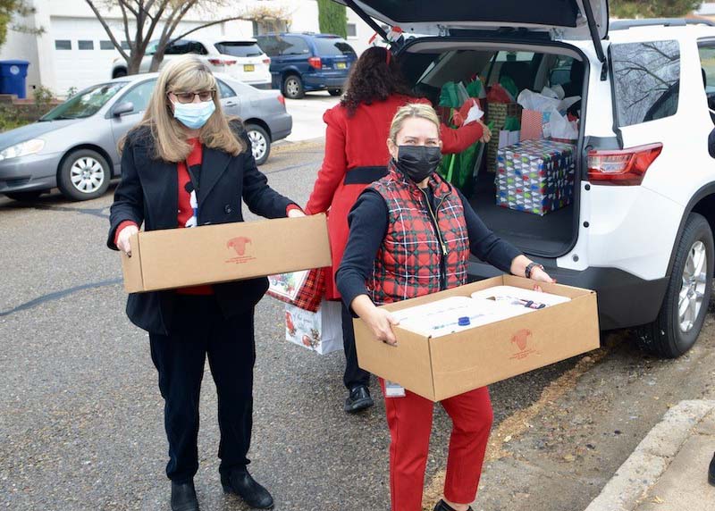 Blue Cross and Blue Shield of New Mexico employees deliver gifts for veterans. 