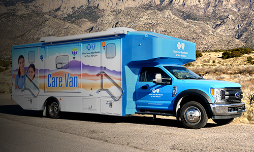 Care Van® parked in front of rocky terrain